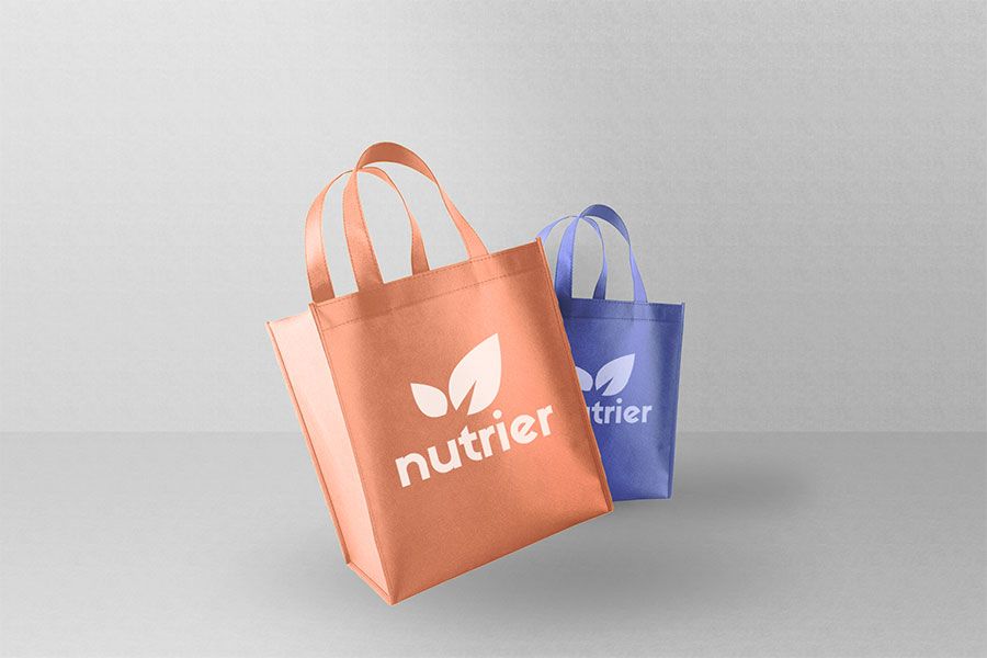 Promotional tote bags with a logo prominently displayed