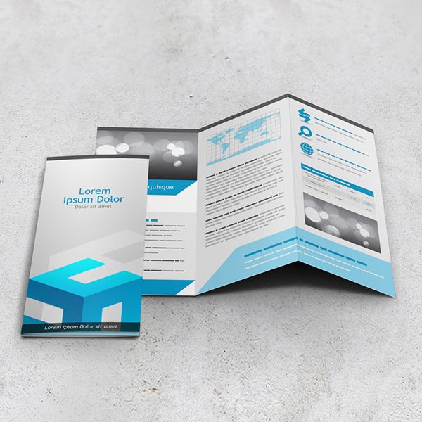 Rendering of a Brochure Template with A Blue, White, and Gray Three-Panel Brochure Open and Another Closed on Top of It
