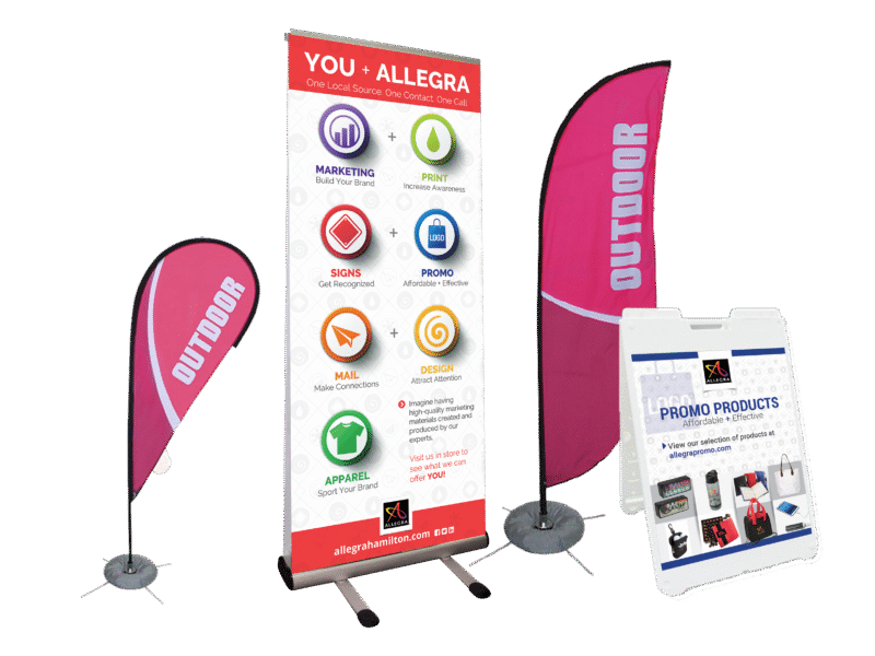 A selection of outdoor banners, flags, and A-frames